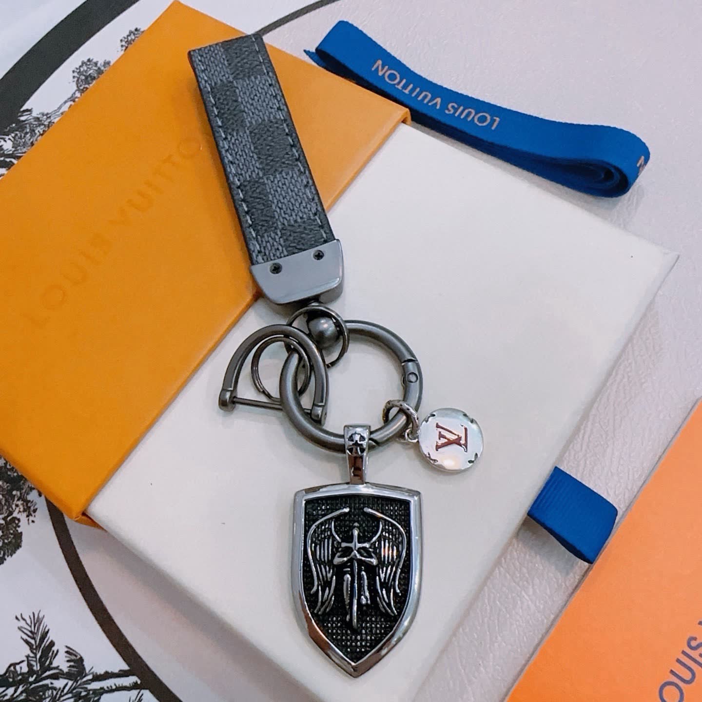 Louis Vuitton Keychain with Shield and Leather Strap